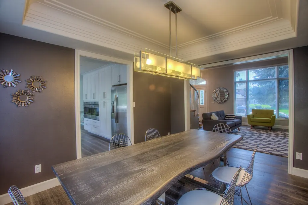 Finished timber-look flooring in a dining and living room on the Mid North Coast
